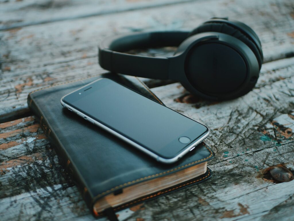 Birth of a podcast-Life's a Gas-iphone and headphones by Aaron Burden